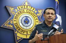 Harris County Sheriff Ed Gonzalez stands at a podium at the county jail