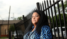 Image via DMN of woman staring into distance